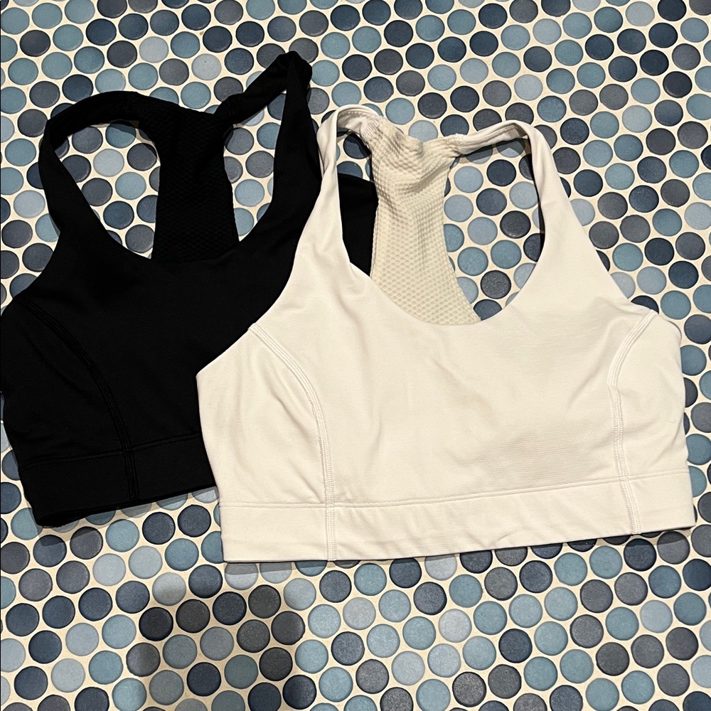 Pair of ‘Doing Things Bra’ outdoor voices sports bra black/navy and white